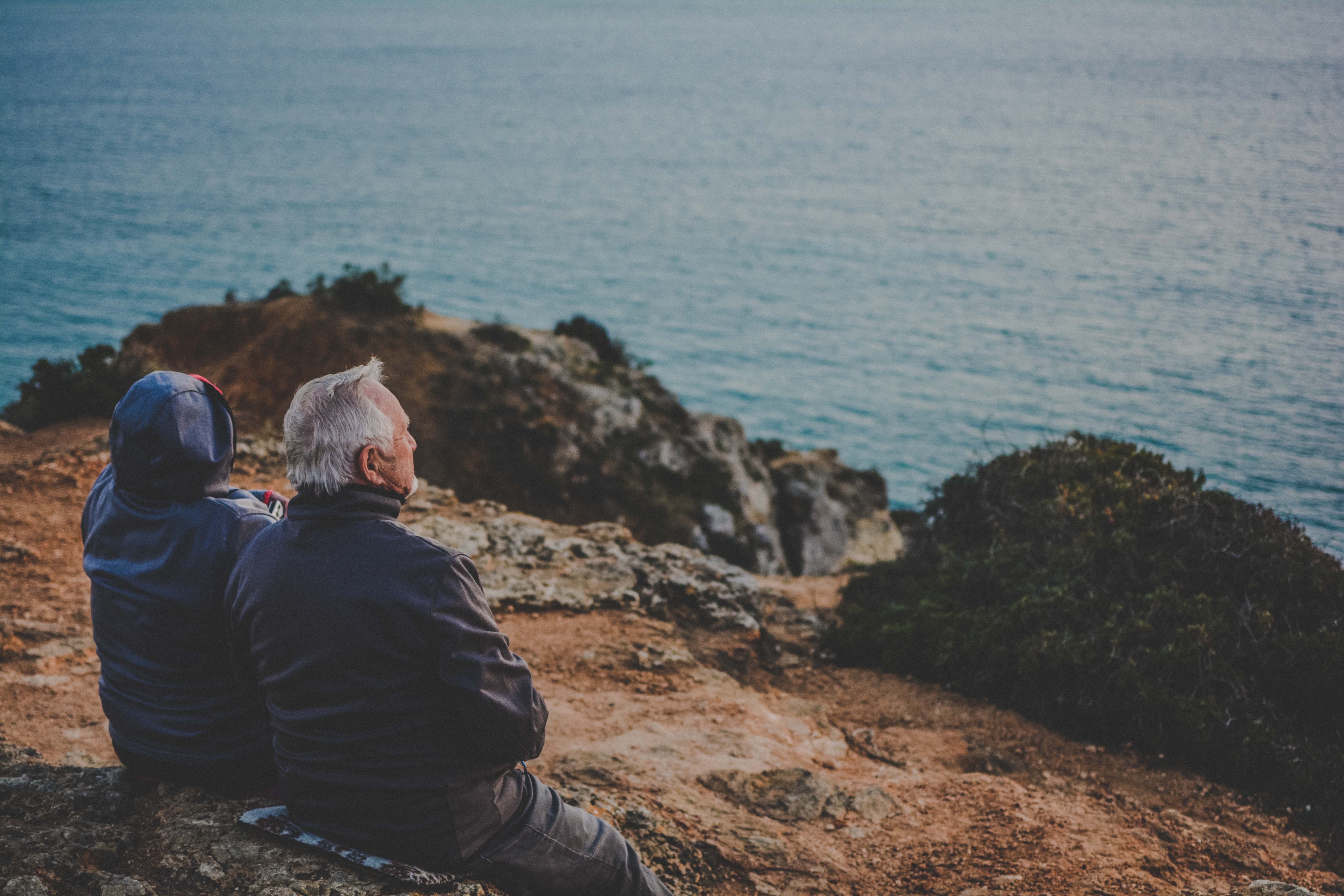 Elderly look over ocean